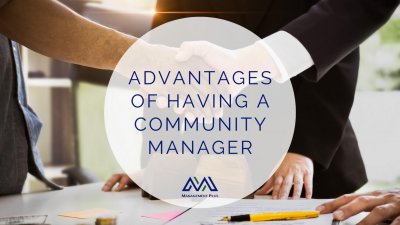 Close up of three men standing over a table, 2 of them shaking hands with an overlay of text that reads: Advantages of Having a community Manager